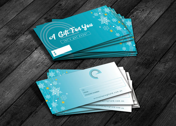 Gift certificates are shown in two piles on a wooden surface. 